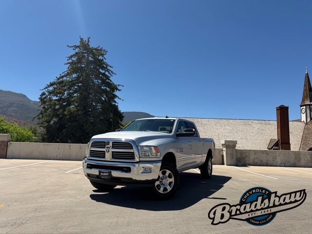 2016 RAM 2500 Big Horn in Bright Silver Clearcoat Metallic — front three-quarter view