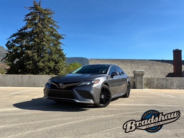 2023 Toyota Camry XSE in Predawn Gray Mica — front three-quarter view