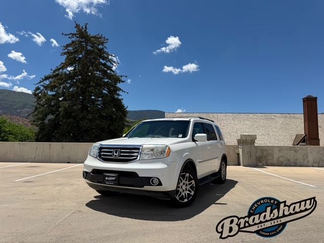 2014 Honda Pilot Touring in White — front three-quarter view