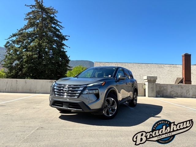 2025 Nissan Rogue SV in Gun Metallic — front three-quarter view
